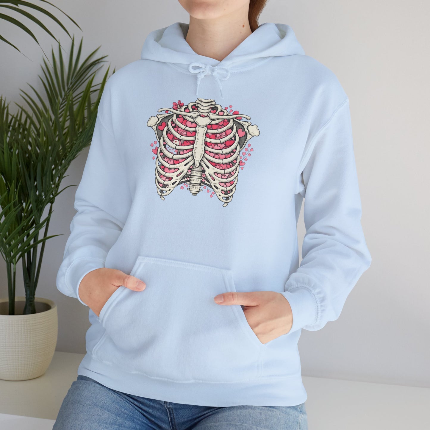 Ribcage Bloom Hoodie — Floral Skeleton Chest Graphic Sweatshirt