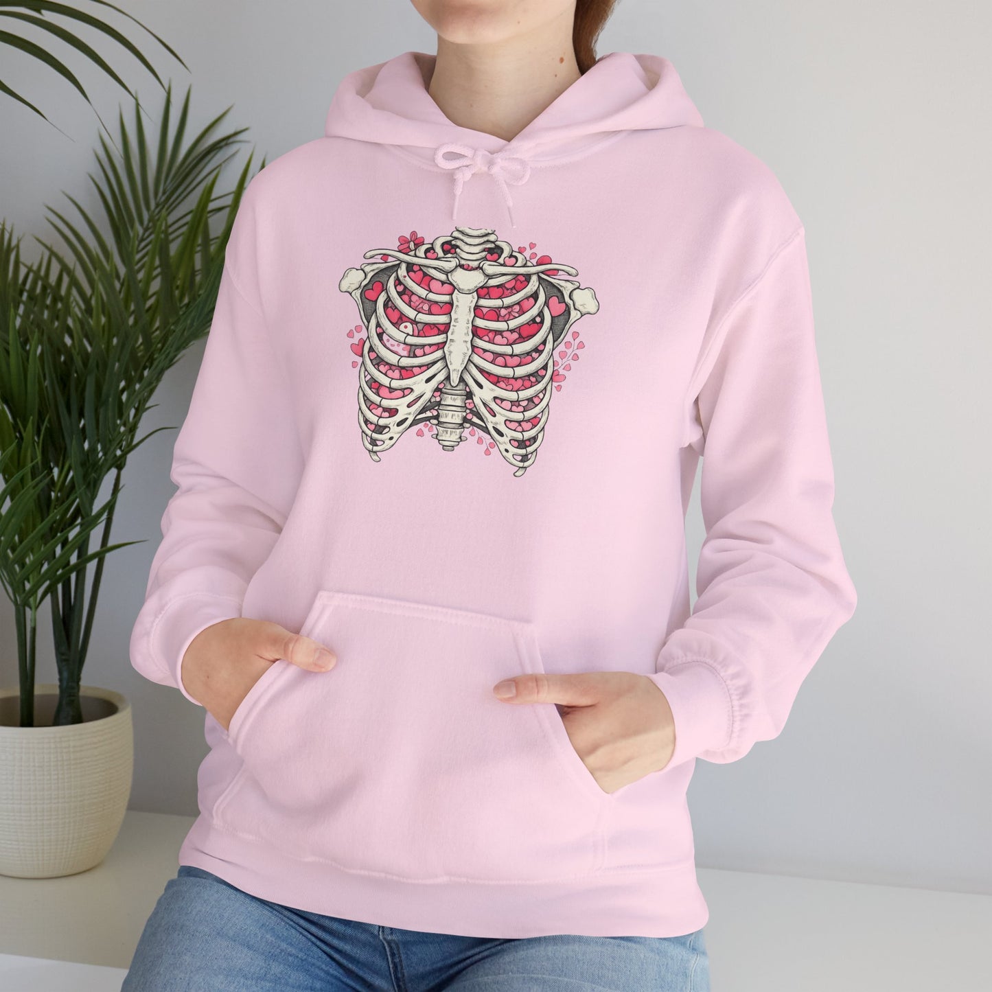 Ribcage Bloom Hoodie — Floral Skeleton Chest Graphic Sweatshirt